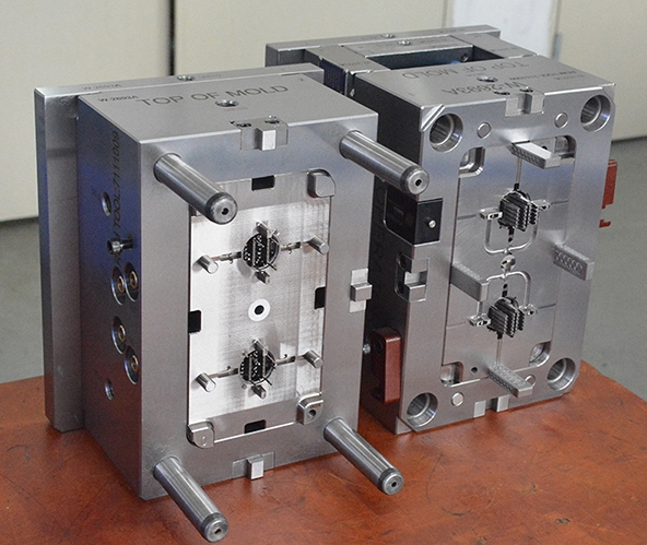 表述什么是精密(塑料)注塑模具